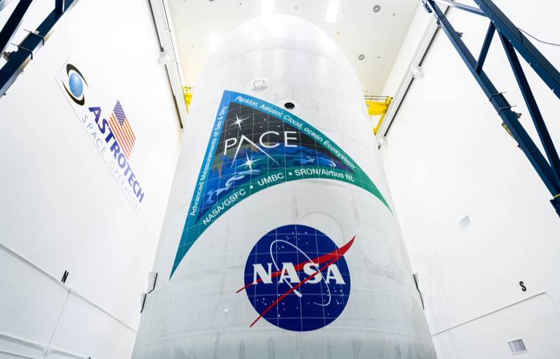 NASA and SpaceX technicians encapsulate NASA's PACE (Plankton, Aerosol, Cloud, ocean Ecosystem) spacecraft in SpaceX’s Falcon 9 payload fairings on Jan. 30, 2024, at the Astrotech Space Operations Facility near the agency’s Kennedy Space Center in Florida. Image credit: NASA/SpaceX