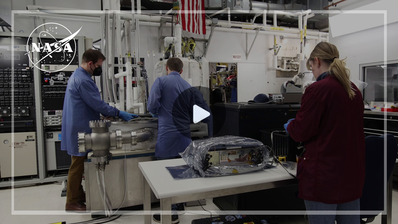 Video thumbnail of NASA engineers securing the BurstCube satellite in a thermal vacuum chamber for testing.