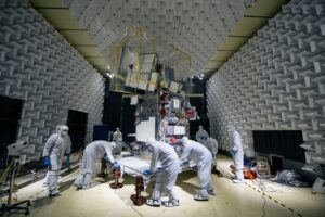 Technicians move the Plankton, Aerosol, Cloud, Ocean Ecosystem (PACE) observatory inside the Electromagnetic Interference Testing Facility at NASA's Goddard Space Flight Center in Greenbelt, Maryland on January 30, 2023.