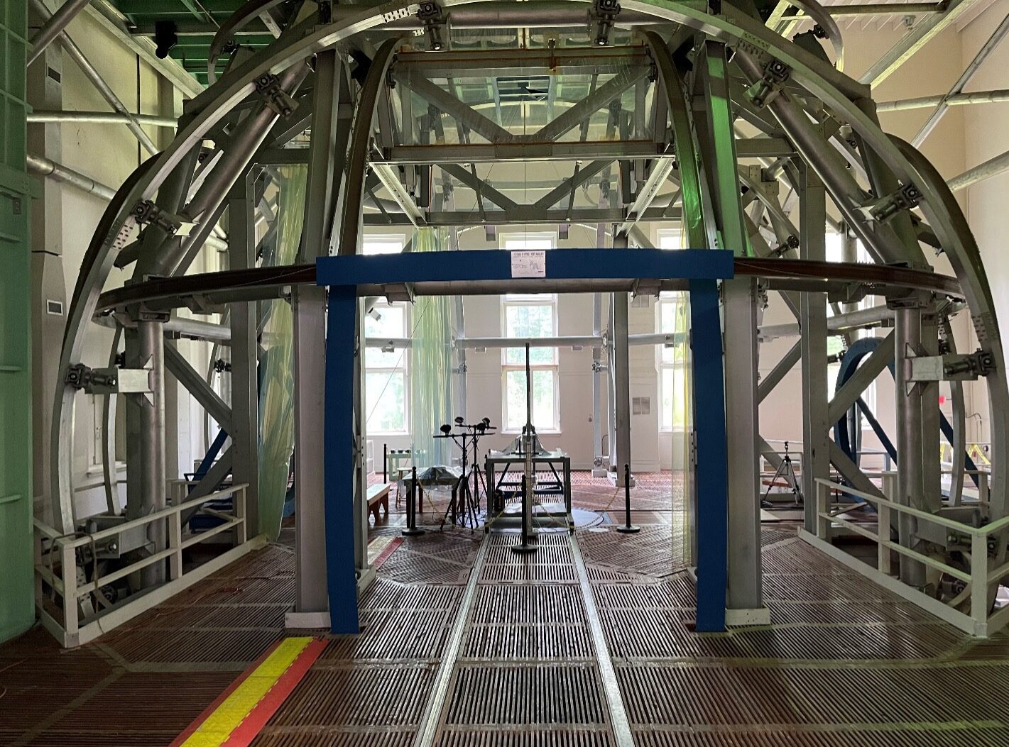 NASA’s Magnetic Test Facility at the Goddard Space Flight Center. The building is made of “nonmagnetic materials such as wood an aluminum” and has a large coil system that cancels out Earth’s magnetic field.