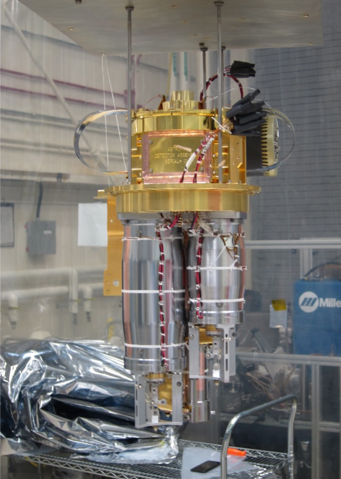 Profile view of Adiabatic Demagnetization Refrigerator (ADR) System suspended above performance test dewar in Cryogenic Research Integration Facility (CRIF) clean tent at NASA/GSFC. Profile view of Adiabatic Demagnetization Refrigerator (ADR) System suspended above performance test dewar in Cryogenic Research Integration Facility (CRIF) clean tent at NASA/GSFC.