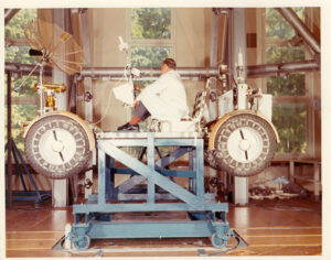 Man sitting on Apollo 16 Lunar Roving Vehicle Magnetic during testing in 1971 at Goddard Space Flight Center in Greenbelt, Maryland.