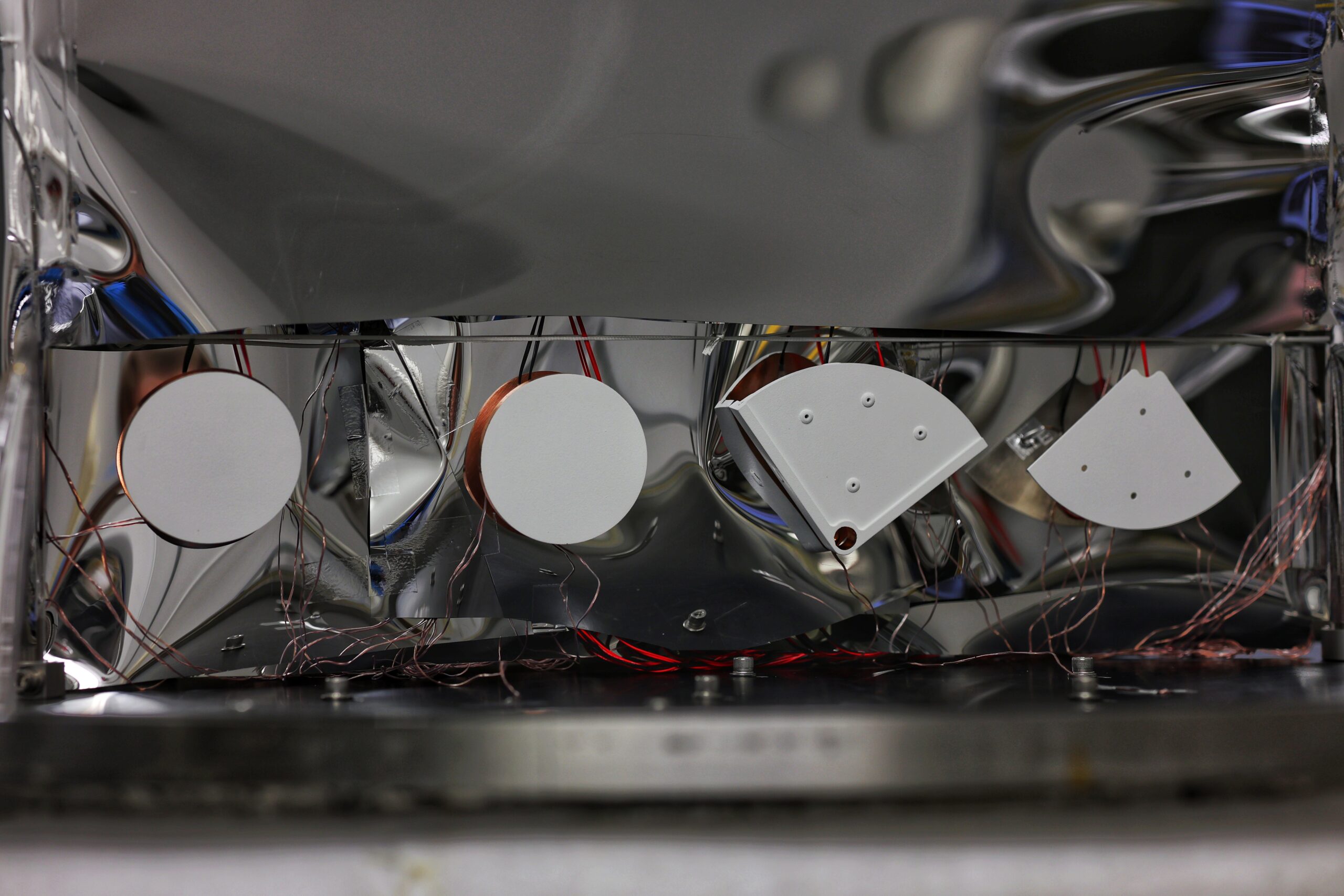 Test samples made from solid-solid phase change material, copper, or both before exposure to extreme temperatures in a thermal vacuum chamber located in the Thermal Technology Development and Demonstration (T2D2) Facility at Goddard Space Flight Center in Greenbelt, Maryland